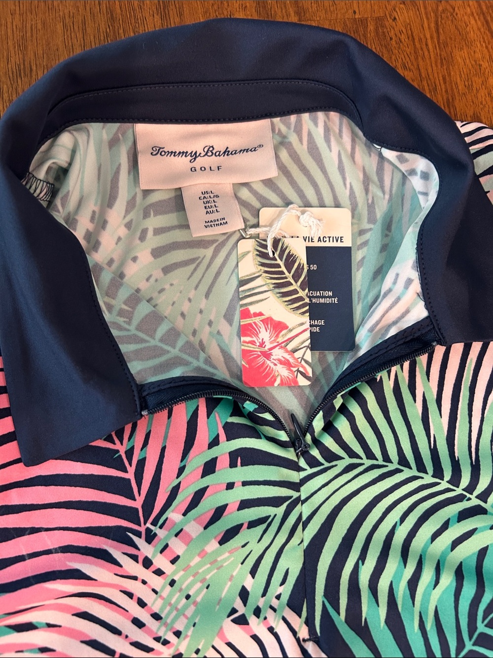 Tommy Bahama Sleeveless Golf Polo in Navy, Pink & Green Palm Print